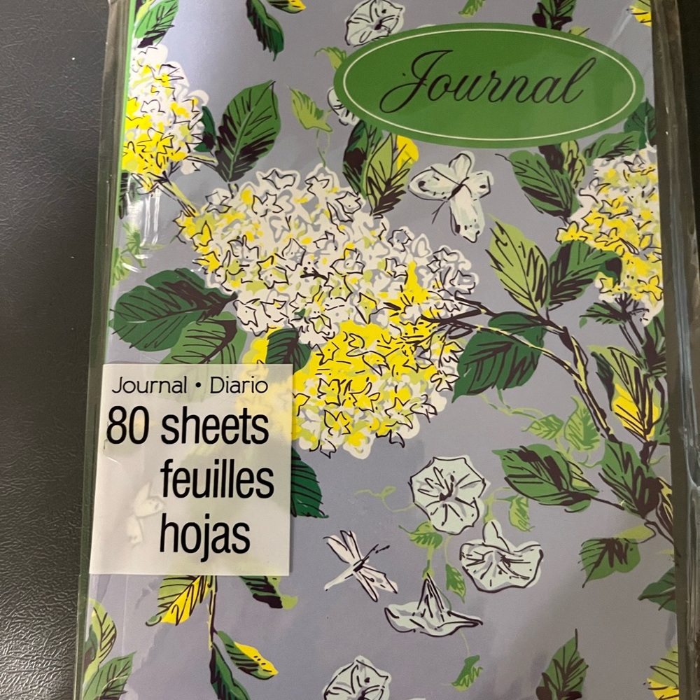 New in package April Cornell 80 page journal.  Blue floral print.  Softcover.